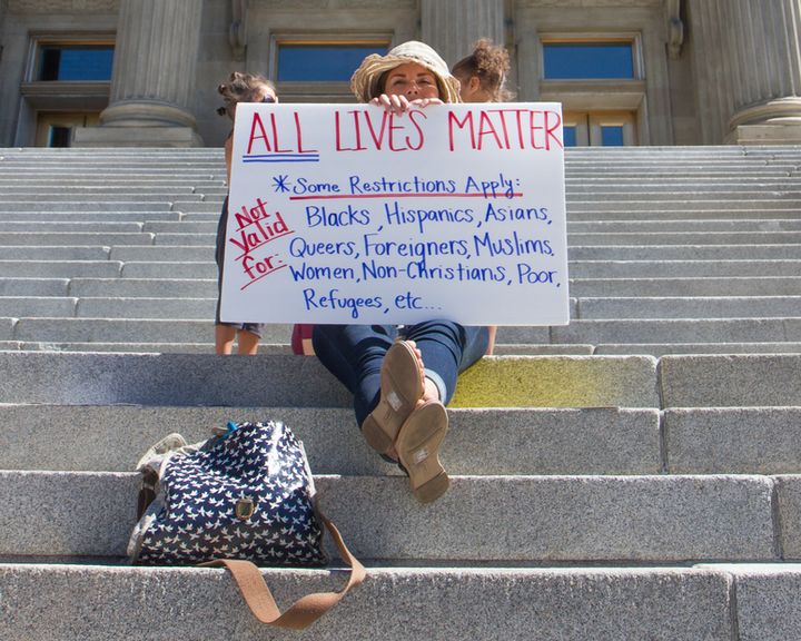 Boise, USA- July 16, 2016: Woman holds an All lives matter showing the irony of the statement
