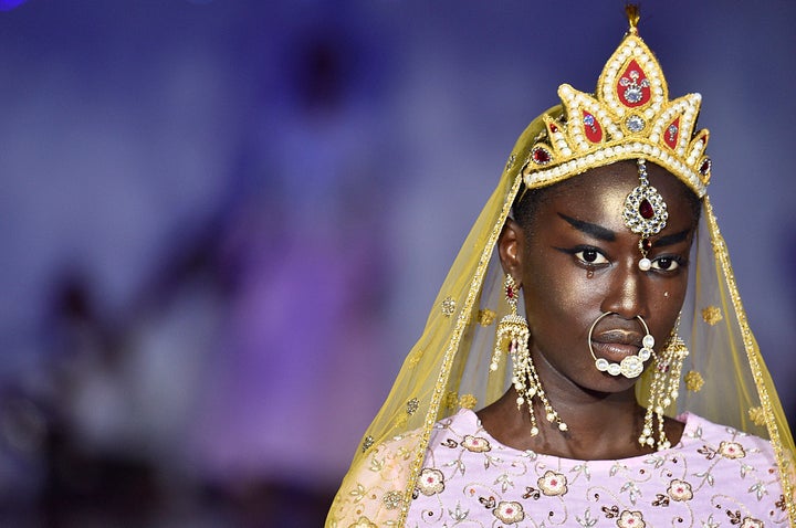 A model walks the runway at the Ashish show during London Fashion Week Spring/Summer 2017