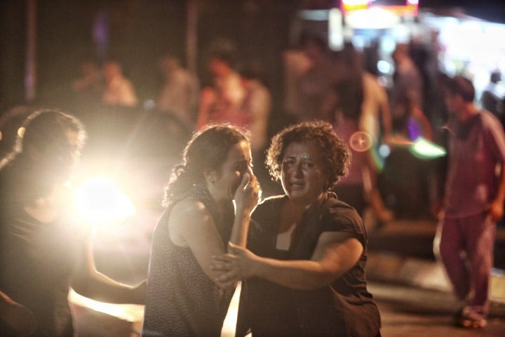 Relatives of the Ataturk Airport suicide bomb attack victims wait outside Bakirkoy Sadi Konuk Hospital, in the early hours of June 29, 2016, Turkey.