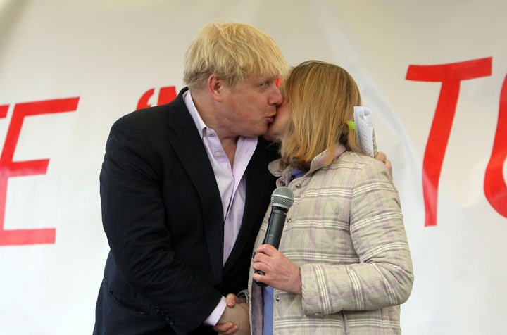 Boris Johnson kisses Justine Greening at a rally in West London to oppose Heathrow expansion