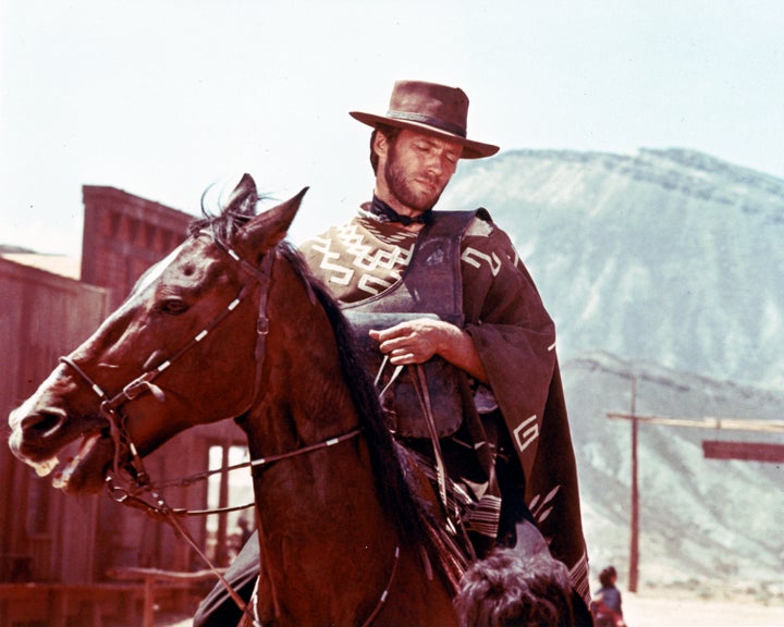 Clint Eastwood as the 'Man with No Name' character, which he played in the series of 'Spaghetti Westerns' directed by Segio Leone. 