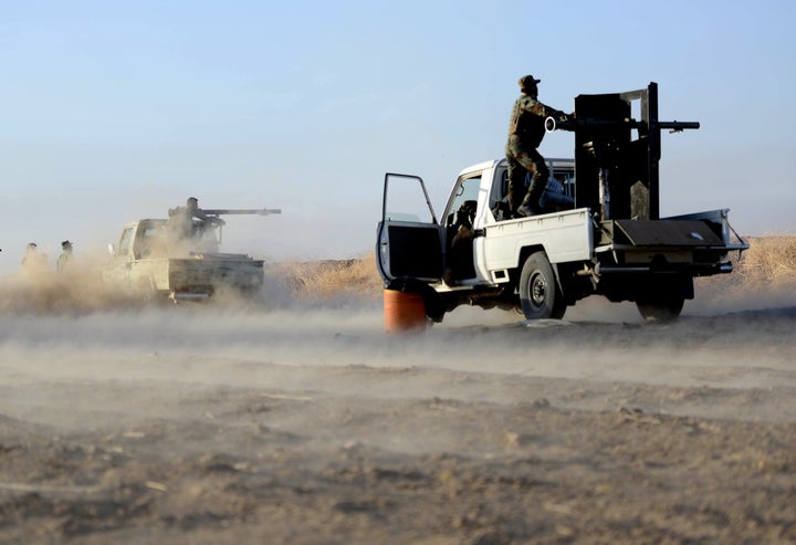 Peshmerga forces attack ISIS targets on Oct. 17 near Mosul.