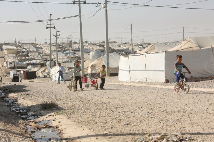 Displaced Iraqi children who fled Mosul are pictured at a refugee camp in Duhok, Iraq.