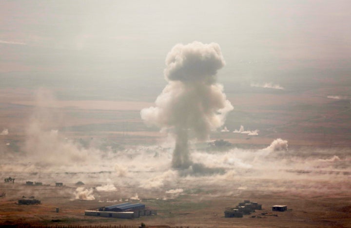 Smoke rises at Mosul's Bertela region on Monday after a coalition forces airstrike over ISIS targets.