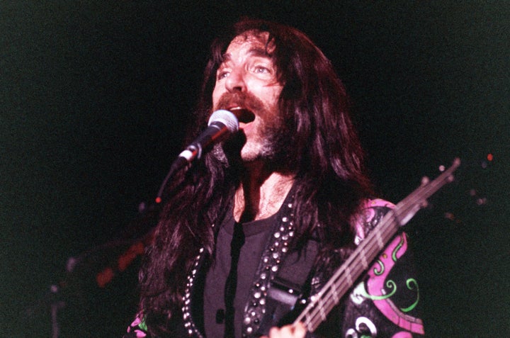 Harry Shearer, seen here in a 1992 photo, playing bassist Derek Smalls of Spinal Tap, has filed a $125 million lawsuit against Vivendi over profits from the band's film and music.