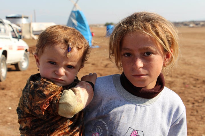 Iraqi Yezidi refugees, who fled from ISIS in the Sinjar district of Mosul, at the Newroz refugee camp in Derik town of Al Hasakah, Syria in Nov. 2014.