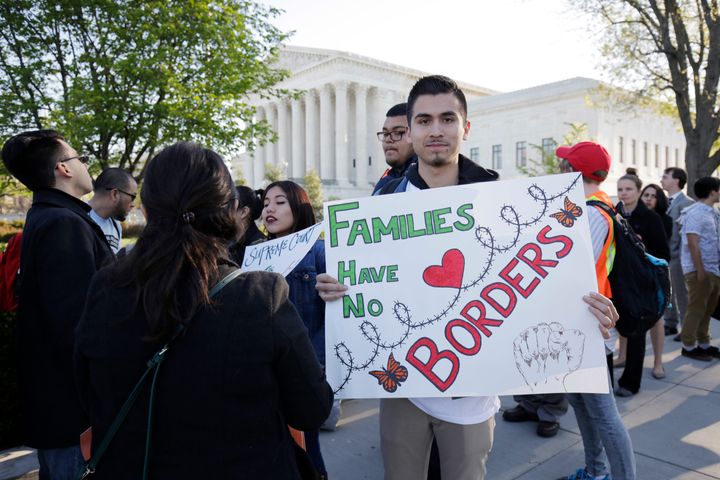 <p>Immigration activists rally outside the U.S. Supreme Court in Washington April 18, 2016.</p>