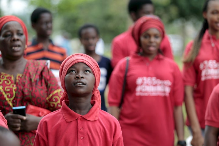 A Bring Back Our Girls (BBOG) campaigner looks on during a protest procession marking the 500th day since the abduction of gi