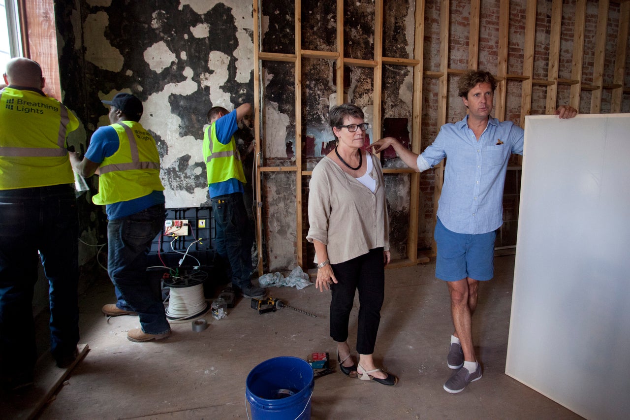 Architect Barbara Nelson and artist Adam Frelin stand in one of the "Breathing Lights" sites.