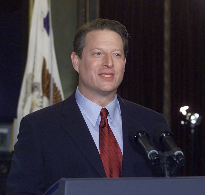 U.S. Vice President Al Gore poses for photographers following his concession speech 13 December, 2000 in his office in the Old Executive Office Building in Washington, DC.