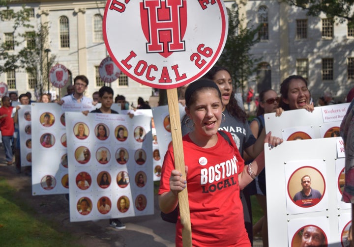 Harvard dining workers and student allies rally on campus for higher wages and more affordable healthcare benefits.