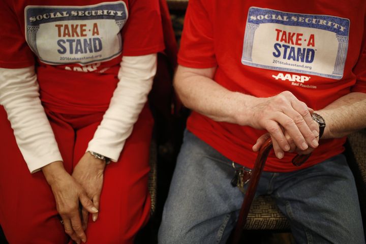 AARP activists await the start of an event for Ohio Gov. John Kasich (R) in Madison, Wisconsin, on March 28. The influential organization is pushing back against its critics.
