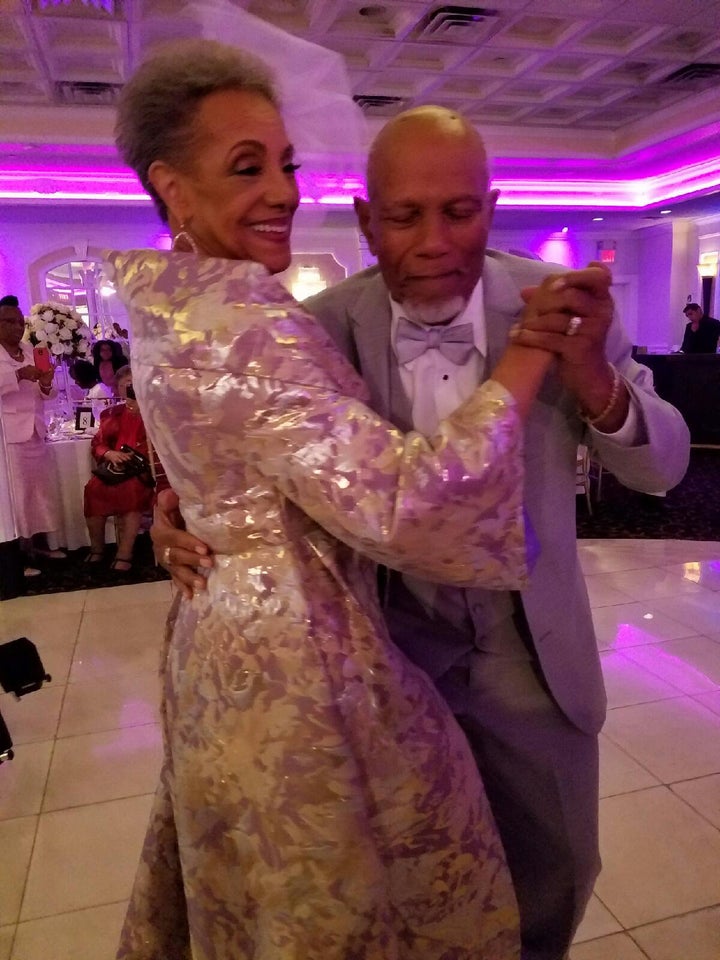 The bride and groom sharing a dance at the reception. 