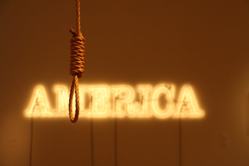 Duck, Duck, Noose by Gary Simmons and America by Glenn Ligon meld together in 30 Americans, on display at the Tacoma Art Muse