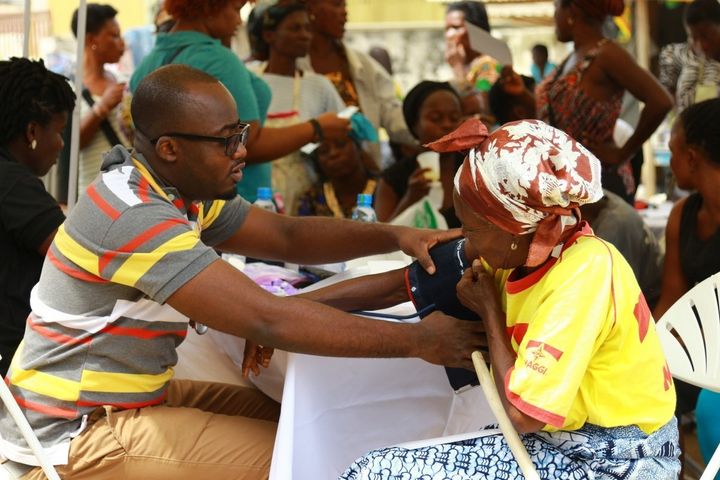 A woman receives a check-up in Accra, Ghana, from an AHN doctor.