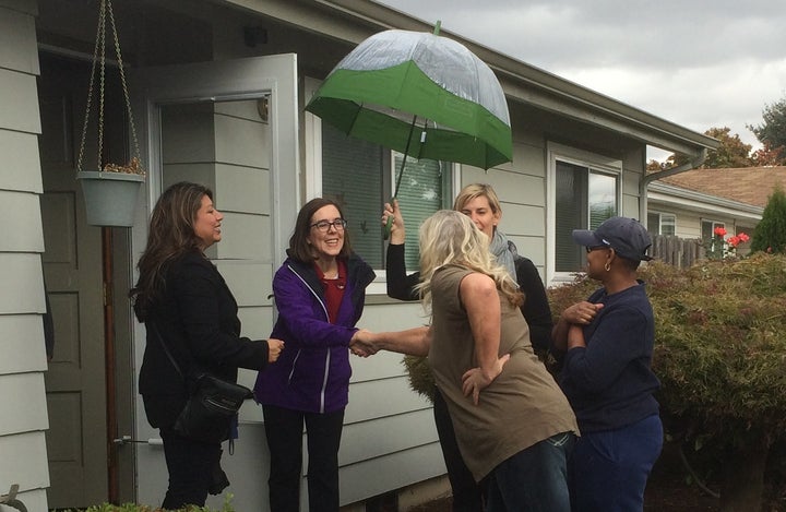 Brown doesn't look like a traditional governor. "She's not a 6'2" guy with a belt buckle," says former Gov. Barbara Roberts. "A lot of people are not comfortable that anybody who looks like that can be a leader." Here she is knocking on people's doors in Salem and saying hi.