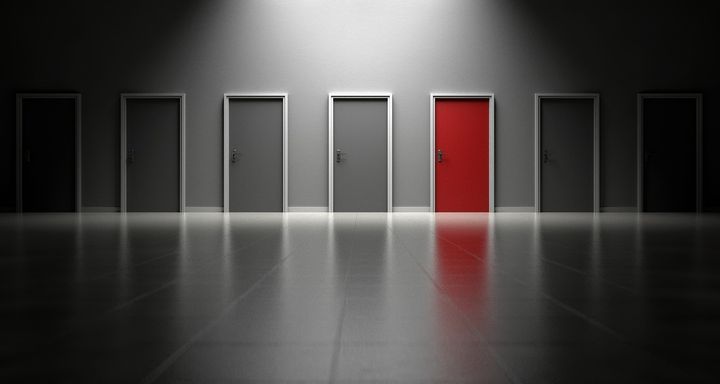 Which door will you choose? Most people will pick the red one, but you need to think again.