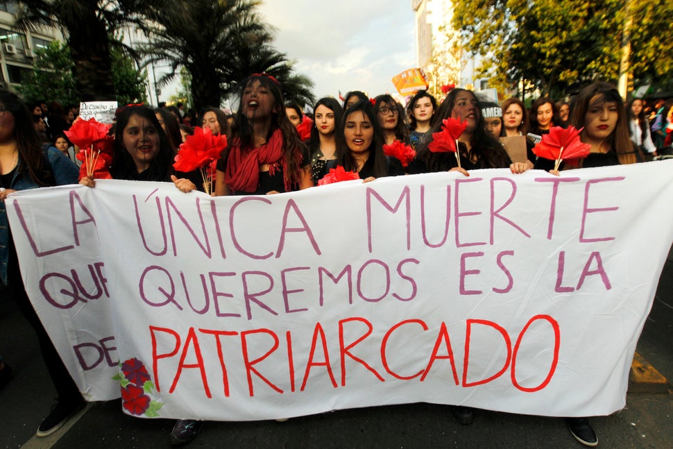 27 Powerful Images Of Women Protesting Against Femicide In Latin