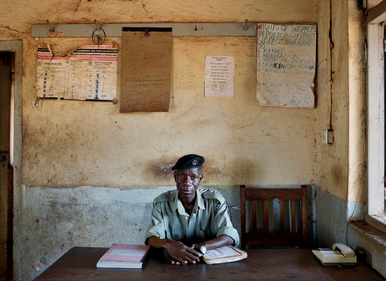 Kakira Police Station in Jinja. Constable # 11431, John Ndalira. (Uganda, May 2010.)