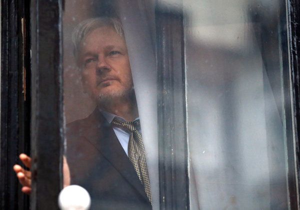 Pictured: Julian Assange, who has been hiding in the Ecuadorian embassy in London