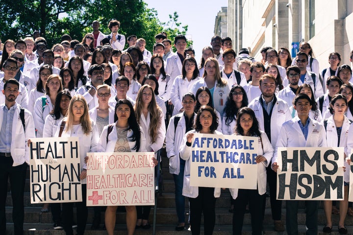 Harvard Medical School students rally in support of Harvard dining services workers on September 12, 2016