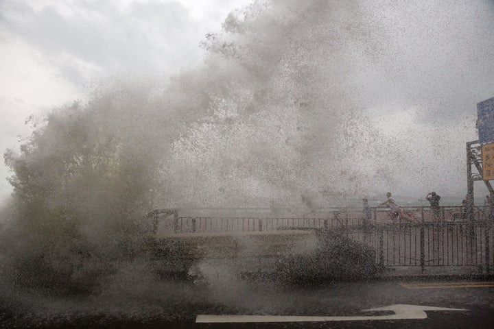 The usually frenetic streets of Hong Kong were deserted on October 21 as the city went into lockdown for Typhoon Haima, which has killed at least eight people in the Philippines.