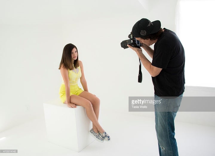 <p>Michael Bezjian founder of The Starving Artists Project shooting actress Luna Balise</p>
