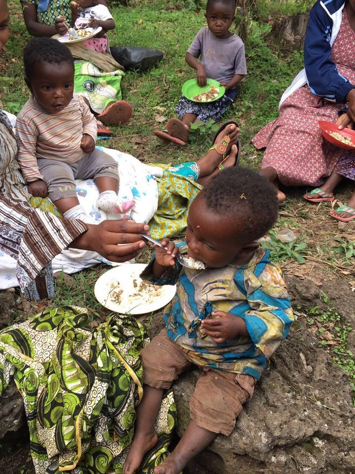 Children in Kigali, Rwanda eating micronutrient-fortified foods.