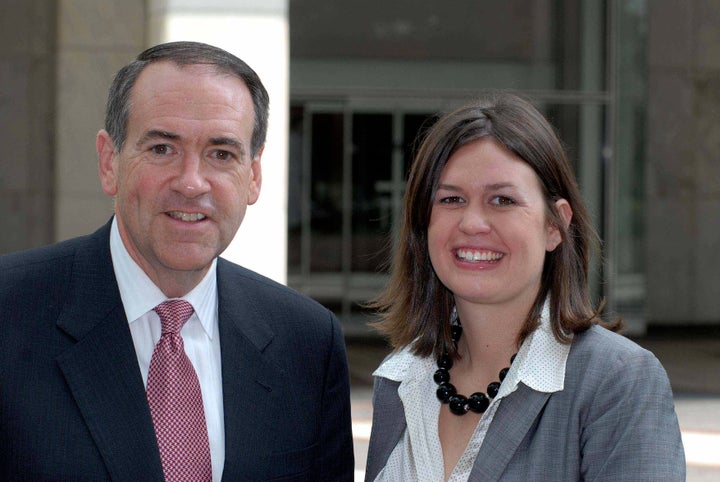 Former Arkansas Gov. Mike Huckabee (R) and his daughter Sarah speak to reporters in Washington, D.C., Aug. 26, 2007.