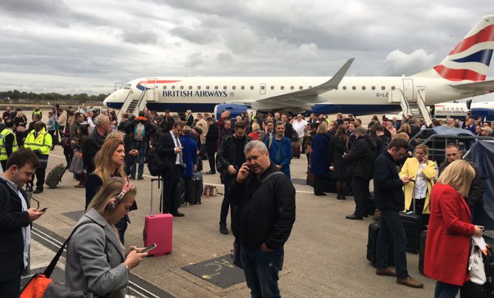 Photos posted to social media appear to show passengers waiting on the tarmac