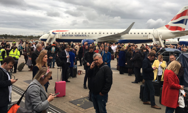 <strong>People on tarmac after the evacuation</strong>