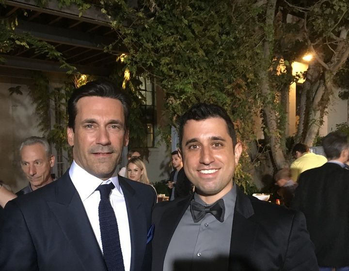 Jon Hamm (star of Keeping Up With the Joneses) poses with Jake Monaco at the movie's premiere