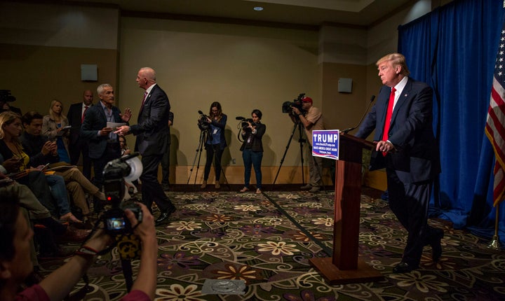 The moment security began attempting to remove Jorge Ramos from Donald Trump's Iowa press conference in August 2015.