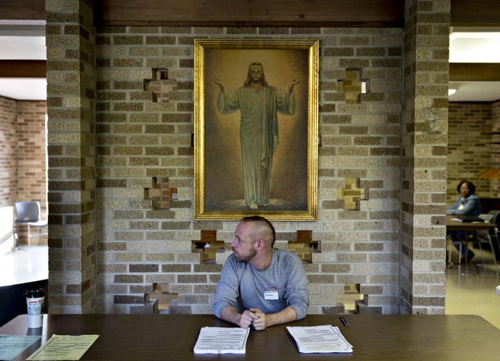 Ballots sit on a table as a precinct worker waits for residents in a polling station during the presidential primary vote in South Bend, Indiana on May 3.