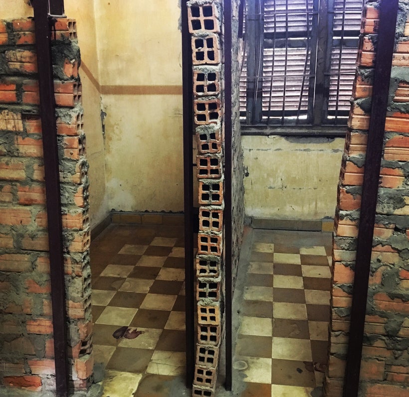 Blood still stains the floors of this Khmer Rouge torture facility in Phnom Penh. Only a recent memory, the genocide that vic