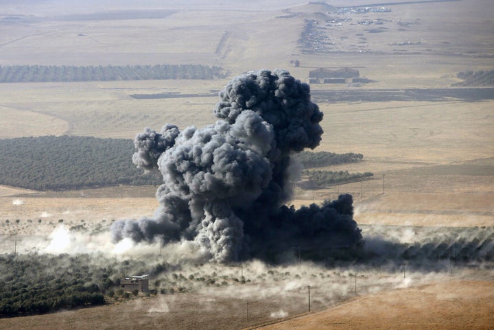 Smoke rises at Islamic State militants' positions in the town of Naweran, near Mosul, Iraq, October 23, 2016