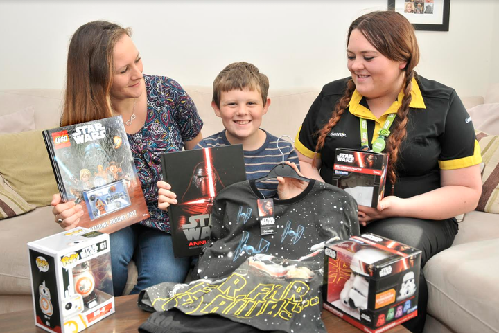 Jen Goodhand with her son Oscar and Asda worker Emma Sanders.