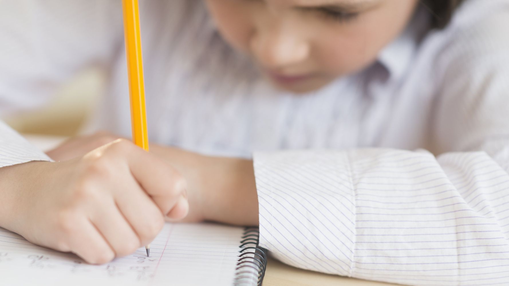 Vi write. Fidgeting. Kid writing a Letter. A girl writing a Letter.