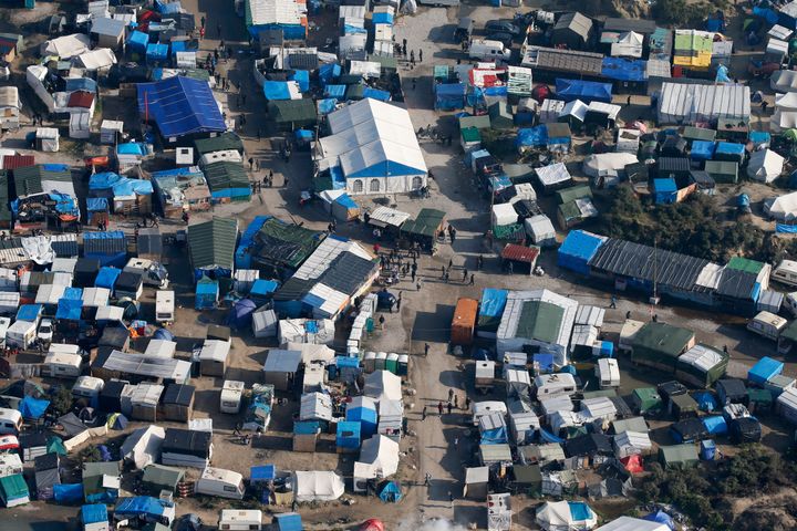 An aerial view shows tents and makeshift shelters in 'The Jungle' camp at Calais