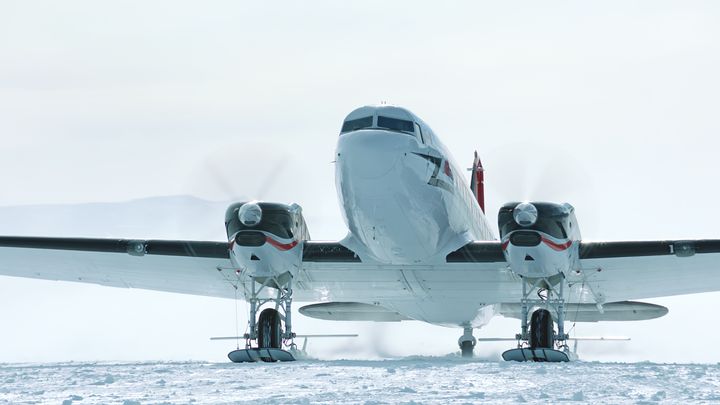 Living In The Age of Airplanes - an airplane departs Antarctica