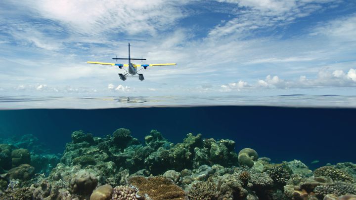 Living In The Age of Airplanes - A seaplane flyover in the Maldives
