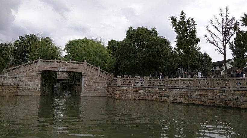 Stone bridges span the canals