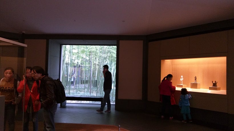 Nature is viewed through the gallery windows