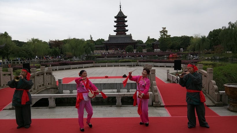 Musicians set the stage for a mock water wedding