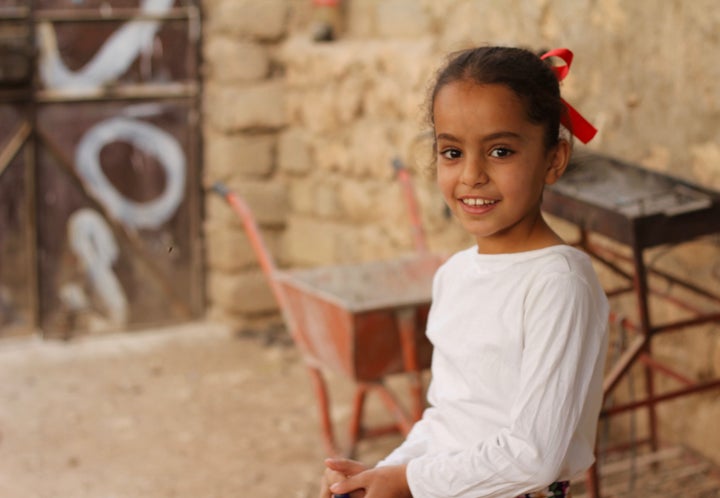 A little girl plays in her backyard in the tiny Christian village of Maghara in northern Iraq. It's just a few miles from Bashiqa, a town that until recently was under ISIS control.