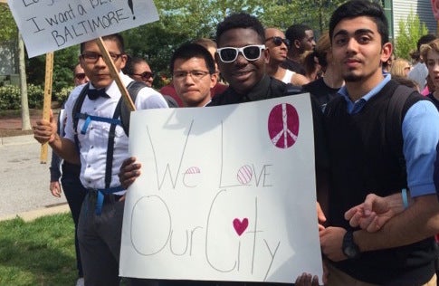 Warshan (right) at a peaceful march in Baltimore during the 2015 protests