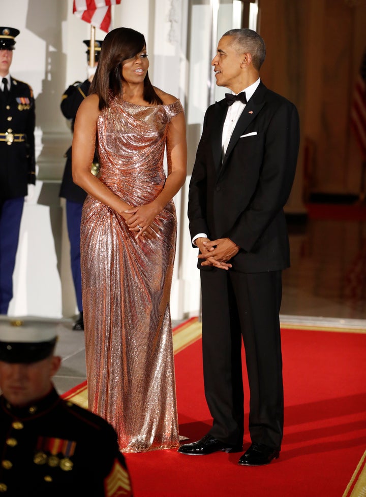 President Barack Obama and the first lady await arrival of the Italian Prime Minister before their final State Dinner at the