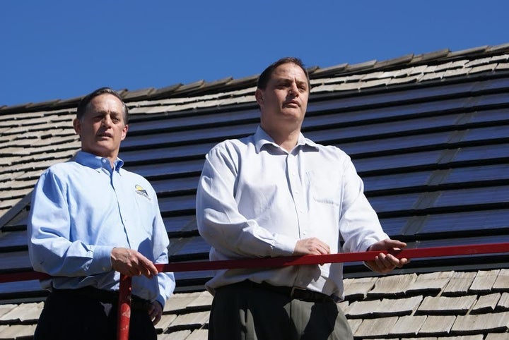 Robert Allen, right, with his business partner and brother, Gary. 