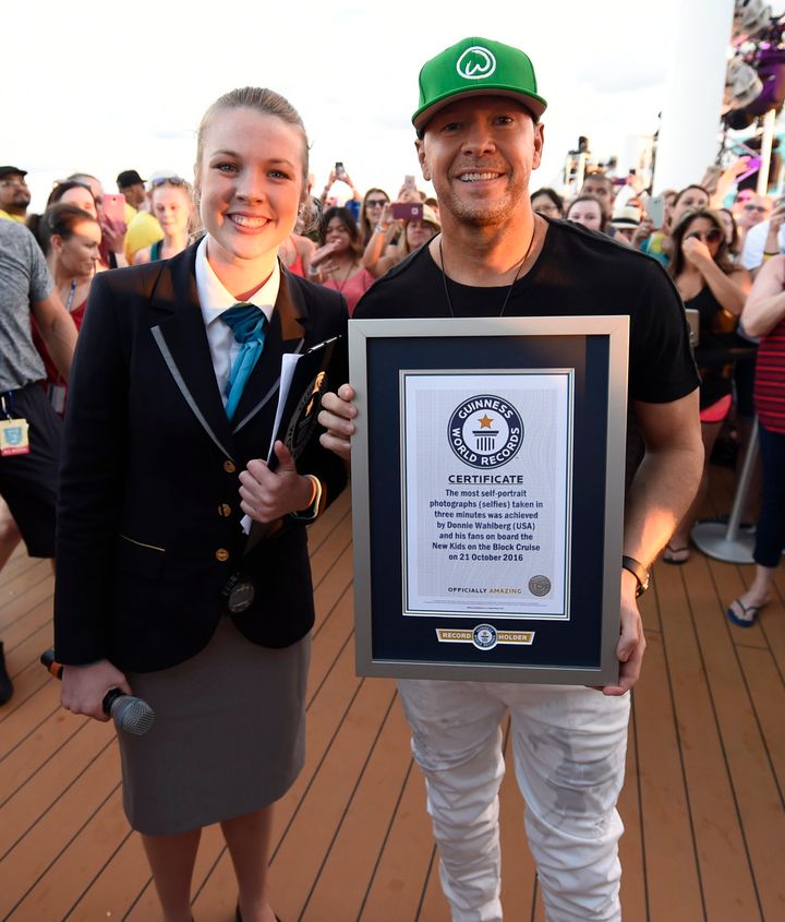 Guinness Worlds Record adjudicator Sarah Casson and Donnie Wahlberg.