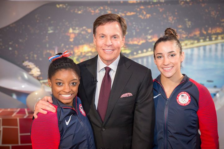 NBC's Bob Costas poses with U.S. gymnasts Simone Biles and Aly Raisman on Aug. 17 at the Summer Olympics. Media coverage of the games was frequently criticized for gender bias.